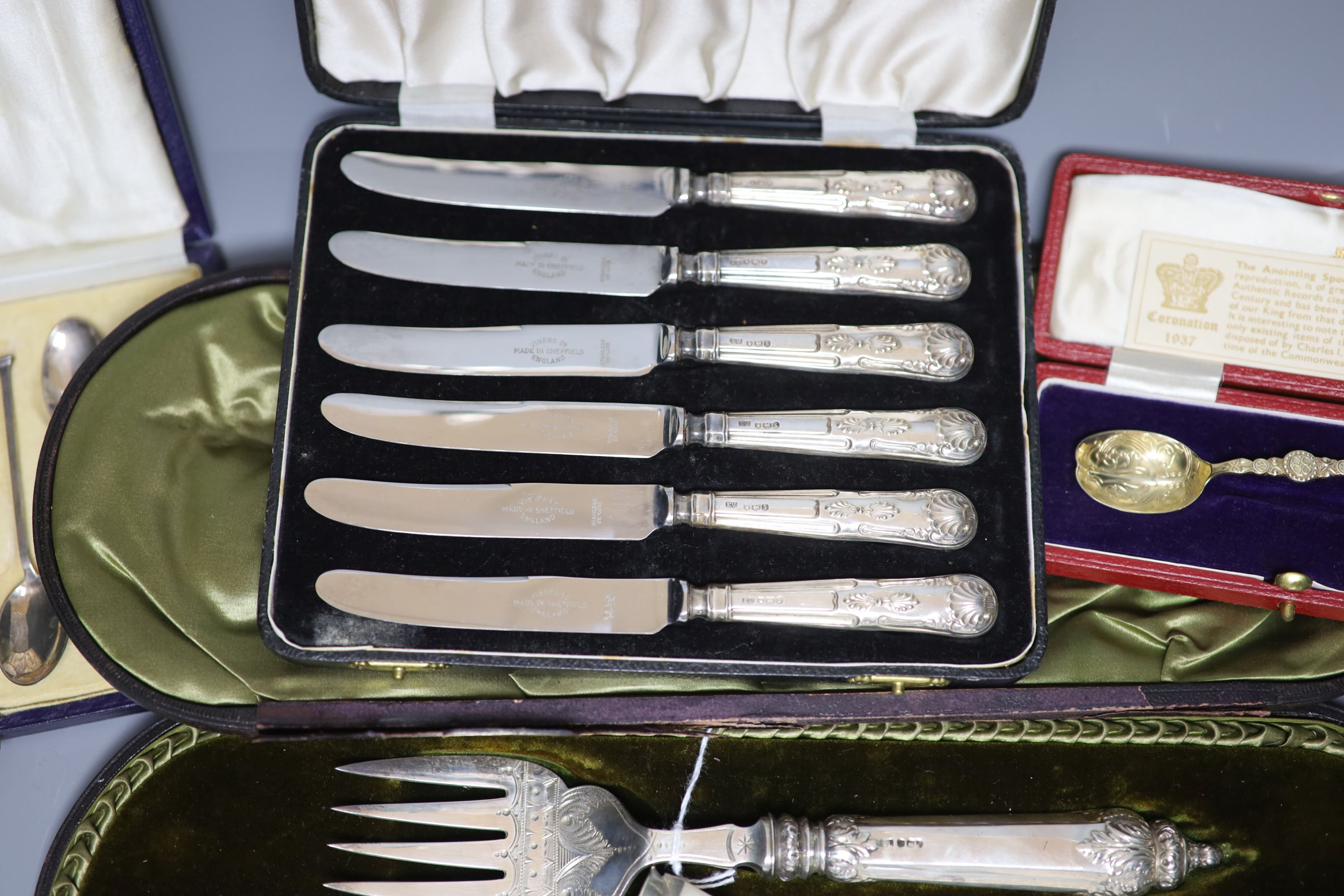 Mixed silver including cased pair of late Victorian silver fish servers, four other cased sets and a silver mounted cigar cutter.